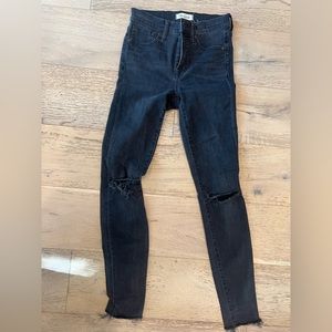Madewell size 26T. Black ripped jeans.